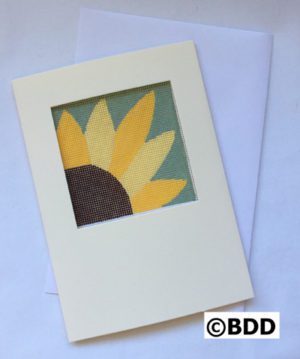 A card with a sunflower cut out of it.