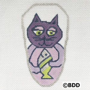 A purple cat with yellow eyes and a candle.