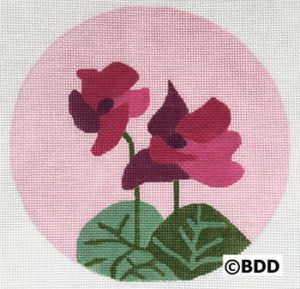 A round painting of two pink flowers.