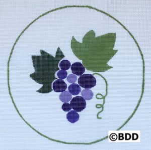 A picture of some grapes in the middle of a circle.