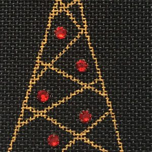 A black fabric with red and gold triangles on it