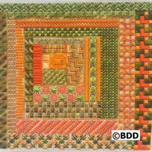 A square of green and orange fabric with a geometric design.