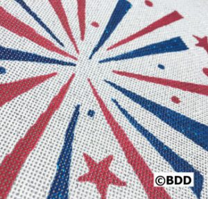 A close up of the stars and stripes on a fabric.