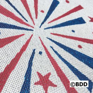 A close up of the stars and stripes on a fabric.