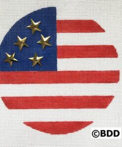 A round american flag with gold stars on it.