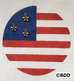 A round of american flag with gold stars.