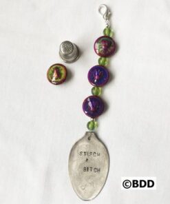 A spoon with some writing on it
