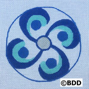 A blue and white circular pattern with four circles.