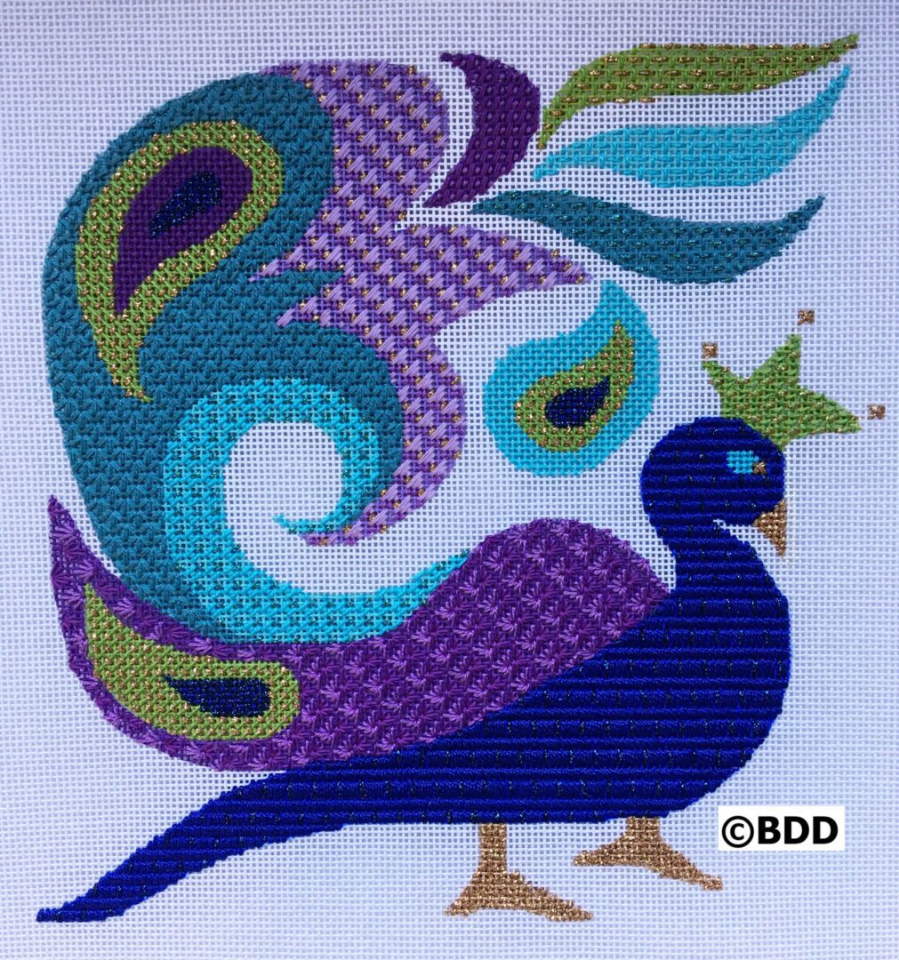 A blue bird with purple and green feathers.