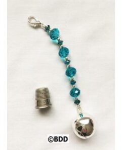 A bell is attached to the end of a chain.