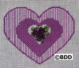 A purple heart with flowers on it.