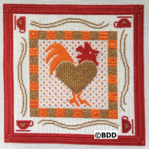 A red and white square with a rooster on it