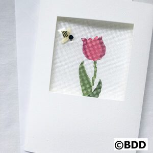 A picture of a bee and a flower.