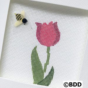 A bee and a flower are shown in this picture.