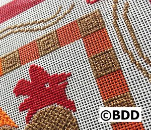 A close up of the cross stitch pattern