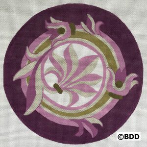 A purple and green rug with a design on it.