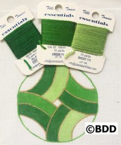 A green circle with three different types of thread.