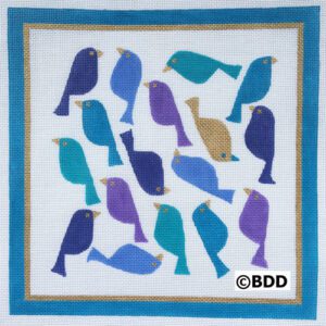 A blue bird quilt with many birds on it.