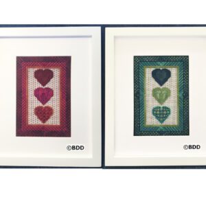 Two framed pictures of hearts on a white background.