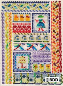 Colorful embroidered sampler with dragonflies and tree