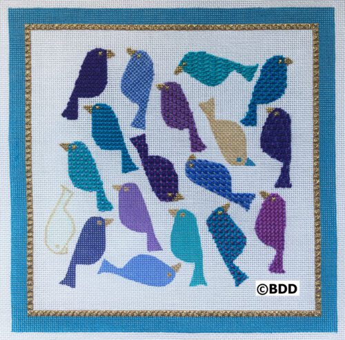 A blue bird pattern with gold trim on the border.