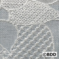 A close up of some white fabric with patterns
