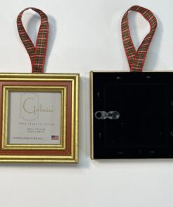 A gold frame with red ribbon hanging from the back.