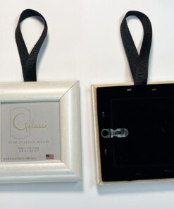 Small pearlescent white frame with black ribbon