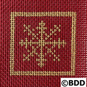 A red and gold cross stitch pattern with a snowflake.