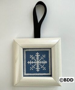 Framed blue cross-stitch ornament with snowflake
