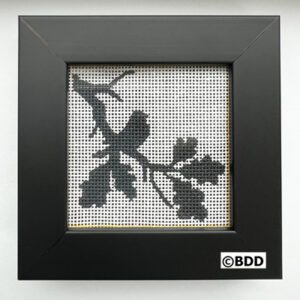 A picture of the back side of a cross stitch pattern.