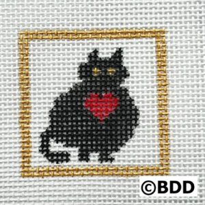 A black cat with red heart in the middle of it's frame.