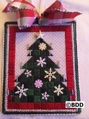 A christmas tree made of blocks with a star on top.