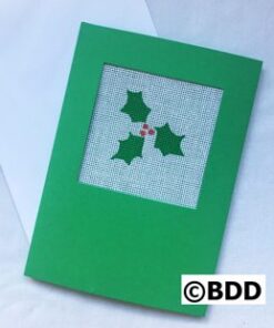 Green greeting card with three holly leaves