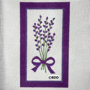 A purple ribbon and lavender bouquet in a frame.