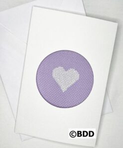 White heart on lavender cross-stitch circle