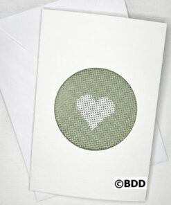 White heart on sage green cross-stitch