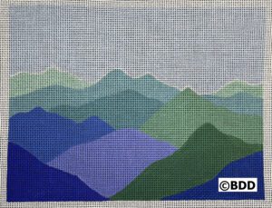 A cross stitch pattern of mountains in the distance.