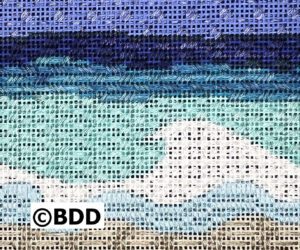 A cross stitch pattern of the ocean and beach.