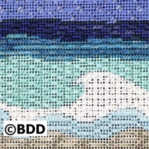 A cross stitch pattern of the ocean and beach.