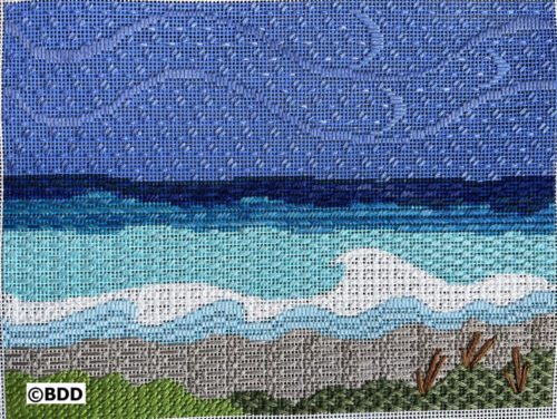 A cross stitch pattern of the ocean and beach.