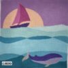 Here's an alt tag for the image: Sailboat and whales at sunset.