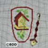 A cross stitch pattern of a bird house.