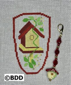 A cross stitch pattern of a bird house.