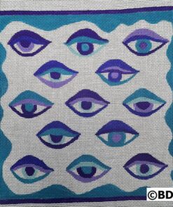 Needlepoint artwork of many eyes.