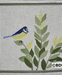 Needlepoint: bluebird on green foliage.