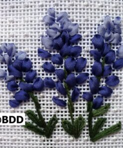 Embroidered bluebonnet ribbon flowers.
