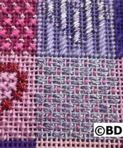 Colorful textured embroidery with heart pattern.